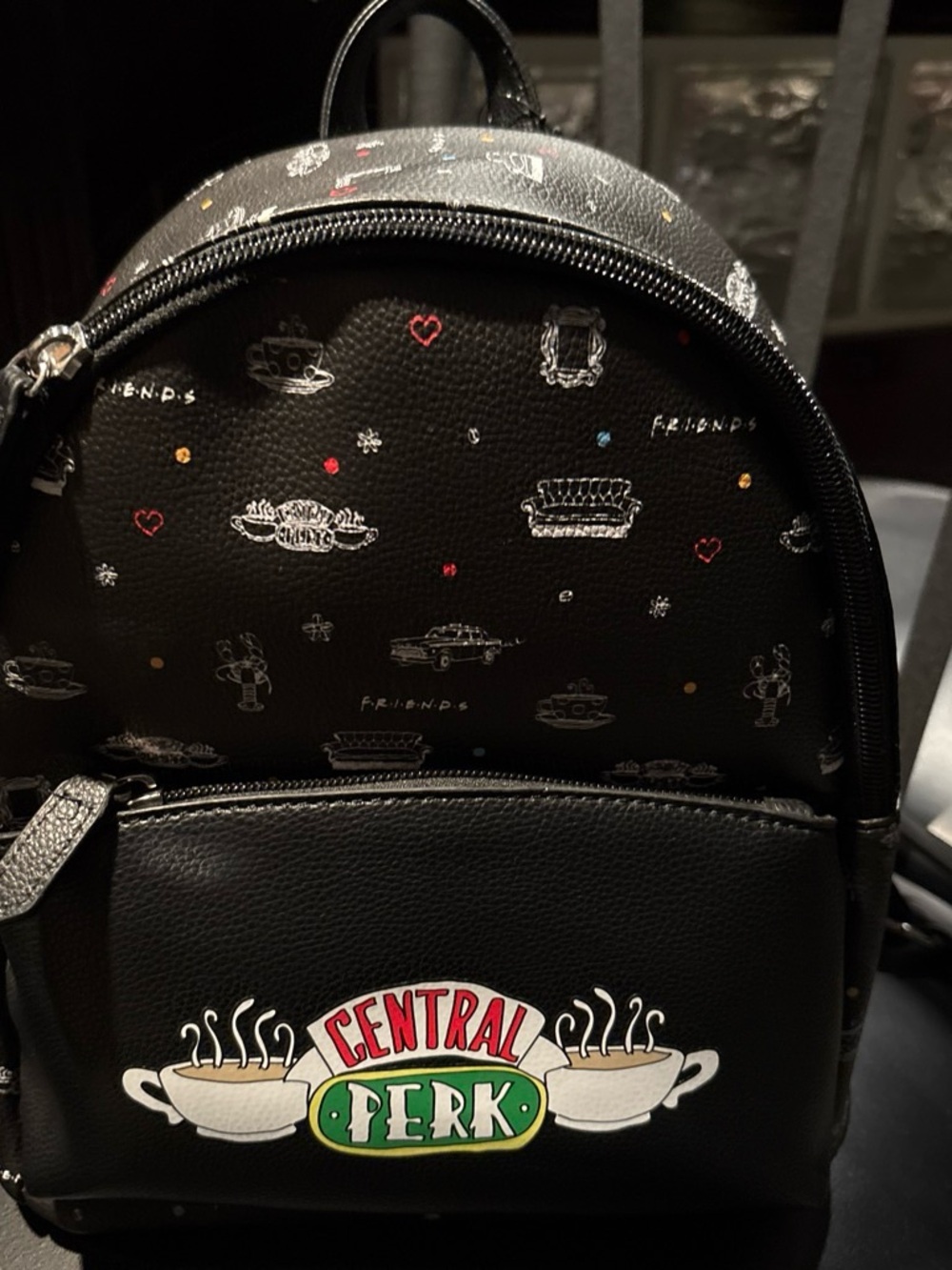 Danielle Nicole Black Central Perk Mini Backpack with Multicolor Accents